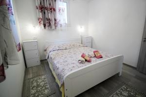 Postel nebo postele na pokoji v ubytování Apartment Kala