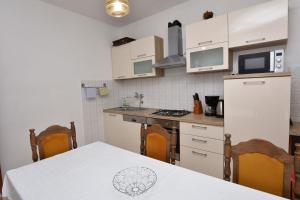 Kuchyňa alebo kuchynka v ubytovaní Apartments Jere Proto