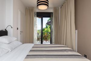 Ένα ή περισσότερα κρεβάτια σε δωμάτιο στο Pampas apartments Mrežnica