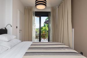 Postel nebo postele na pokoji v ubytování Pampas apartments Mrežnica