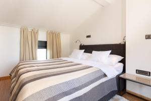 Posteľ alebo postele v izbe v ubytovaní Pampas apartments Mrežnica