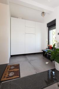 Kuchyňa alebo kuchynka v ubytovaní Pampas apartments Mrežnica