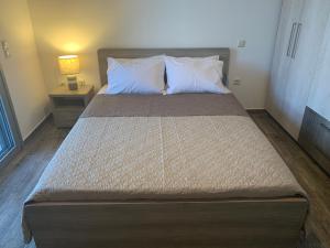 Postel nebo postele na pokoji v ubytování Seastone Villas