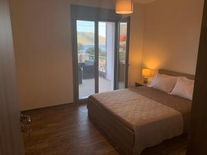 Postel nebo postele na pokoji v ubytování Seastone Villas