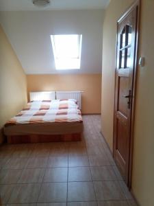 Postel nebo postele na pokoji v ubytování Pokoje Gościnne R10