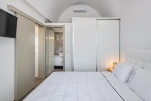 Letto o letti in una camera di Elea Hub