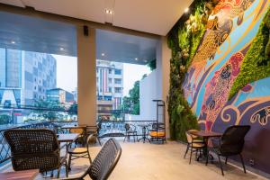 Posezení v ubytování Luminor Hotel Jakarta Kota By WH + 37 fotografií