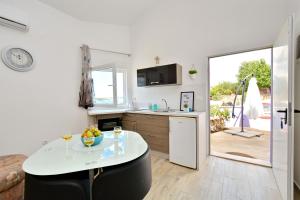 Μια τηλεόραση ή/και κέντρο ψυχαγωγίας στο Holiday Home Paulin