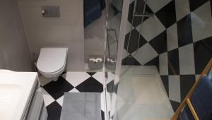 Kúpeľňa v ubytovaní Tukej apartament na Nikiszu