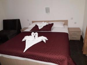 Postel nebo postele na pokoji v ubytování Hotel Ami - M