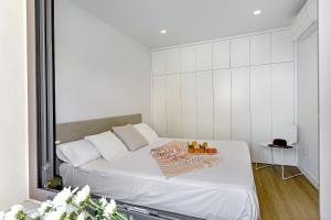 A bed or beds in a room at Townhouse Tonina