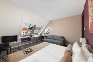 Posteľ alebo postele v izbe v ubytovaní Hotel Moments Budapest by Continental Group