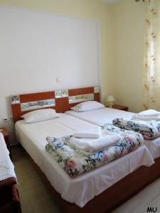 Säng eller sängar i ett rum på Holiday Dream Thalia Apartment