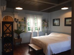 Postel nebo postele na pokoji v ubytování P.O.E Posh Homestay + 37 fotografií