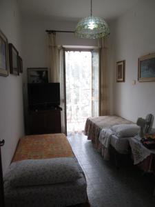 Posteľ alebo postele v izbe v ubytovaní Casa Marcella