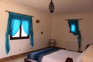 Postel nebo postele na pokoji v ubytování Gîte Raid Oriental