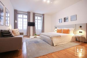 Postel nebo postele na pokoji v ubytování Calacatta Housing