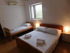 Posteľ alebo postele v izbe v ubytovaní Charming house Tonći
