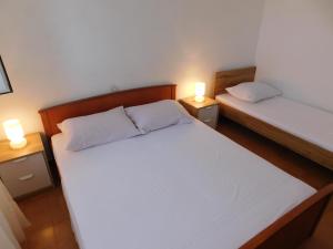 Posteľ alebo postele v izbe v ubytovaní Charming house Tonći