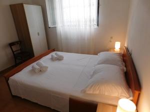 Posteľ alebo postele v izbe v ubytovaní Charming house Tonći
