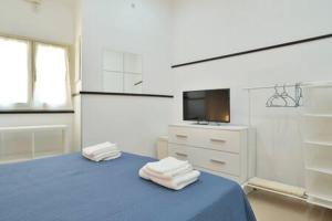 A bed or beds in a room at ragusa curtigghiu