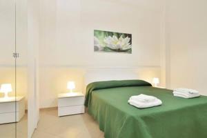 A bed or beds in a room at ragusa curtigghiu