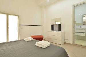 A bed or beds in a room at ragusa curtigghiu