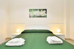 A bed or beds in a room at ragusa curtigghiu