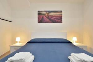 A bed or beds in a room at ragusa curtigghiu
