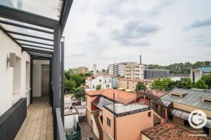 a balcony with a view of a city at YPApartments FIERA in Padova
