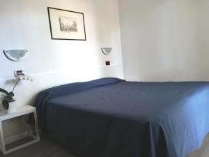 Postel nebo postele na pokoji v ubytování Hotel Friuli + 33 fotografií