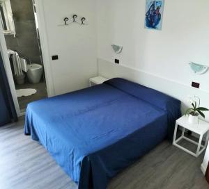 Postel nebo postele na pokoji v ubytování Hotel Friuli