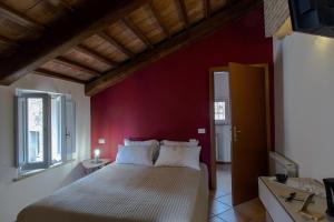 Posteľ alebo postele v izbe v ubytovaní Santa Cecilia Perugia - Rooms&Suite