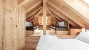 Posteľ alebo postele v izbe v ubytovaní Alla Stazion Locanda nelle Dolomiti