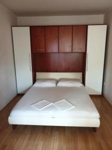 Postel nebo postele na pokoji v ubytování Apartments Davorka