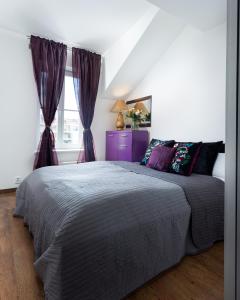 Postel nebo postele na pokoji v ubytování Stylish Apartments Vršovice