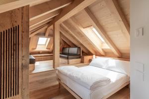 Posteľ alebo postele v izbe v ubytovaní Alla Stazion Locanda nelle Dolomiti