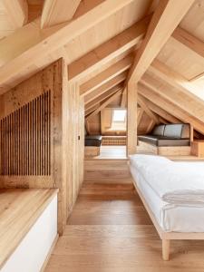 Posteľ alebo postele v izbe v ubytovaní Alla Stazion Locanda nelle Dolomiti