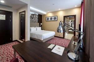 Postel nebo postele na pokoji v ubytování Bashkiria Hotel