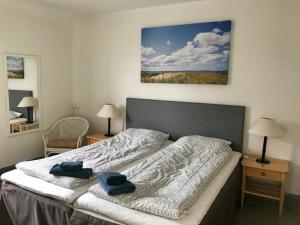 Säng eller sängar i ett rum på Hallandsgården Mellbystrand