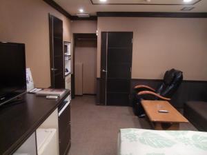 TV a/nebo společenská místnost v ubytování Hotel GOLF Atsugi (Adult Only)