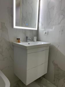 Koupelna v ubytování Julius Hotel
