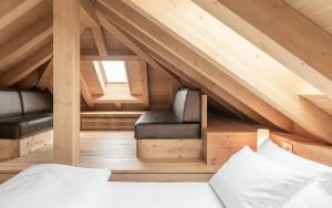 Posteľ alebo postele v izbe v ubytovaní Alla Stazion Locanda nelle Dolomiti