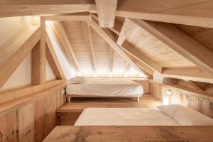 Posteľ alebo postele v izbe v ubytovaní Alla Stazion Locanda nelle Dolomiti
