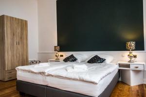 Postel nebo postele na pokoji v ubytování Kleines Hotel Heimfeld