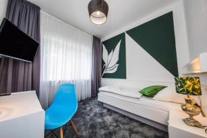 Postel nebo postele na pokoji v ubytování Kleines Hotel Heimfeld