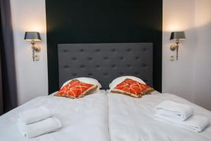 Postel nebo postele na pokoji v ubytování Kleines Hotel Heimfeld