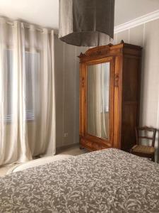 Un pat sau paturi într-o cameră la Le Stanze del Borgo