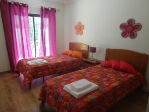 Postel nebo postele na pokoji v ubytování Ria Apartments