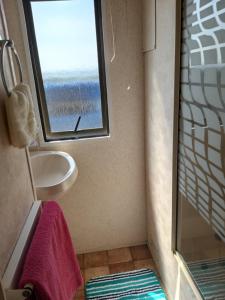 A bathroom at 40 AntrimHeights MOBILE self catering can sleep 6